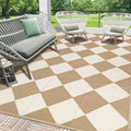 Checkered Reversible Plastic Straw Outdoor Rug
